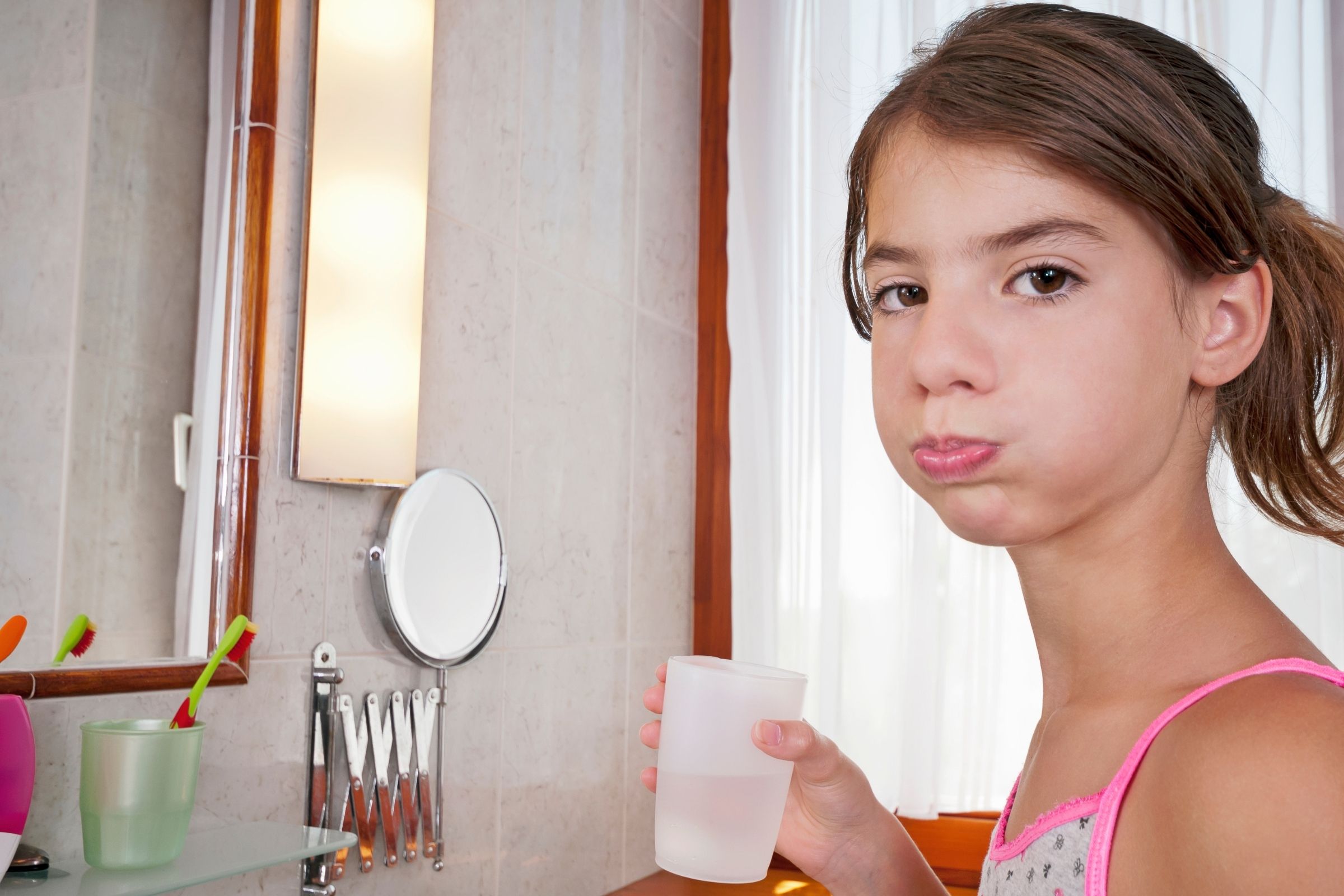 Child rinsing mouth