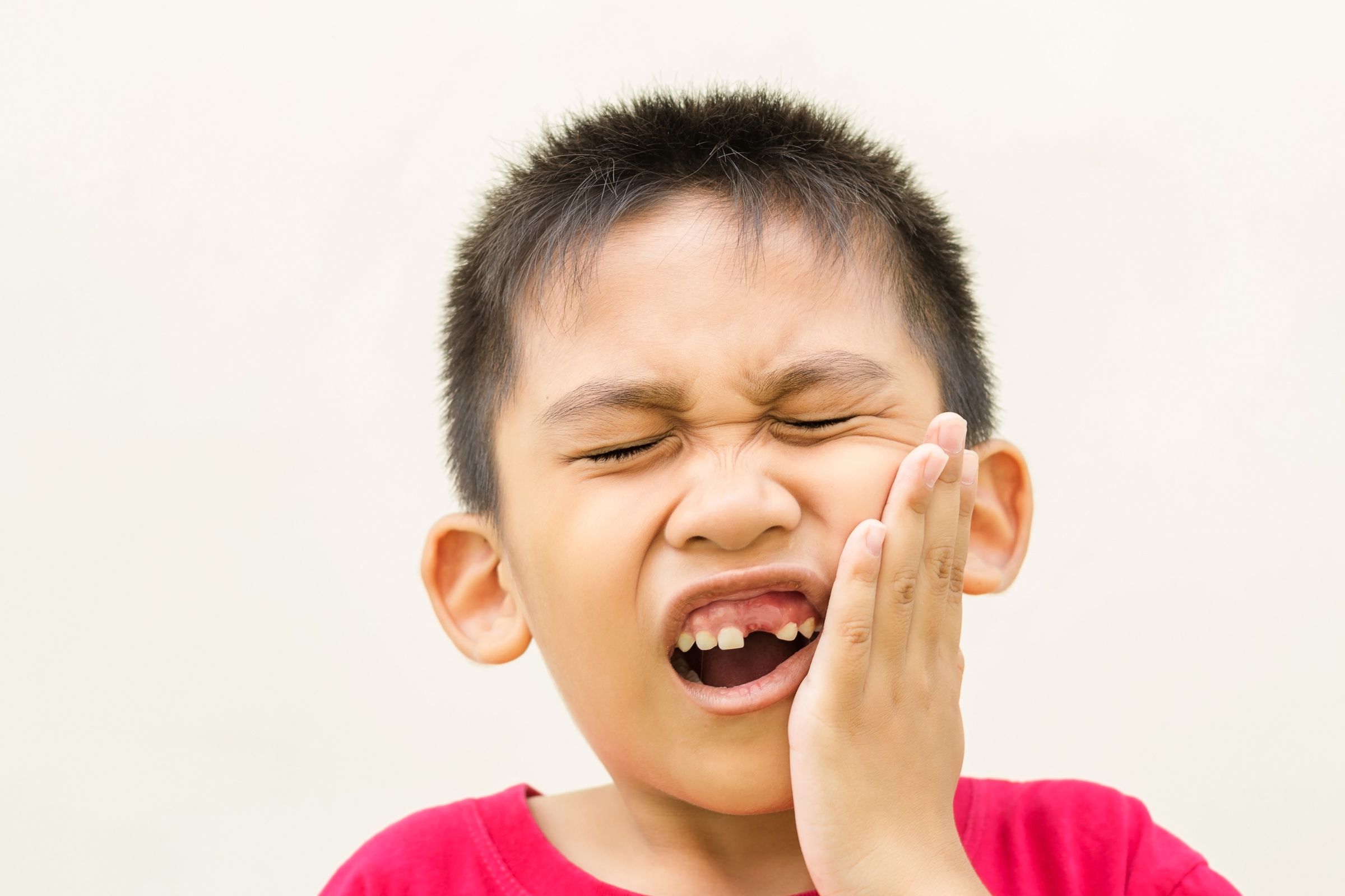 Child in pain with toothache