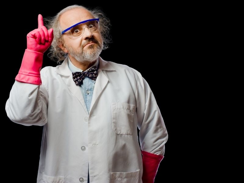 Eccentric scientist pointing upward — the science behind the Toothache Protocol